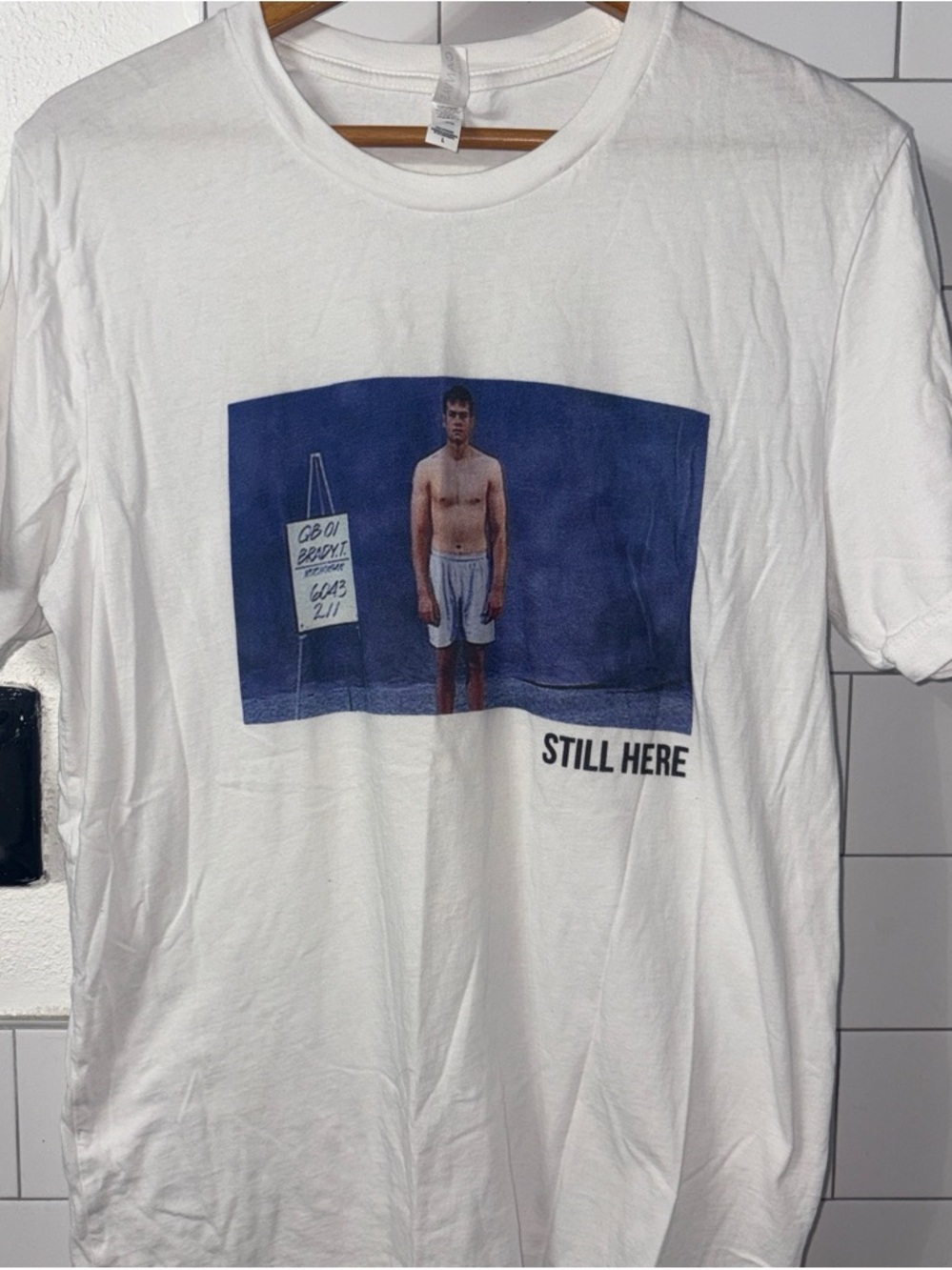 Tom Brady unique Graphic Tee with 'STILL HERE' NFL combine photo. Barstool Sport